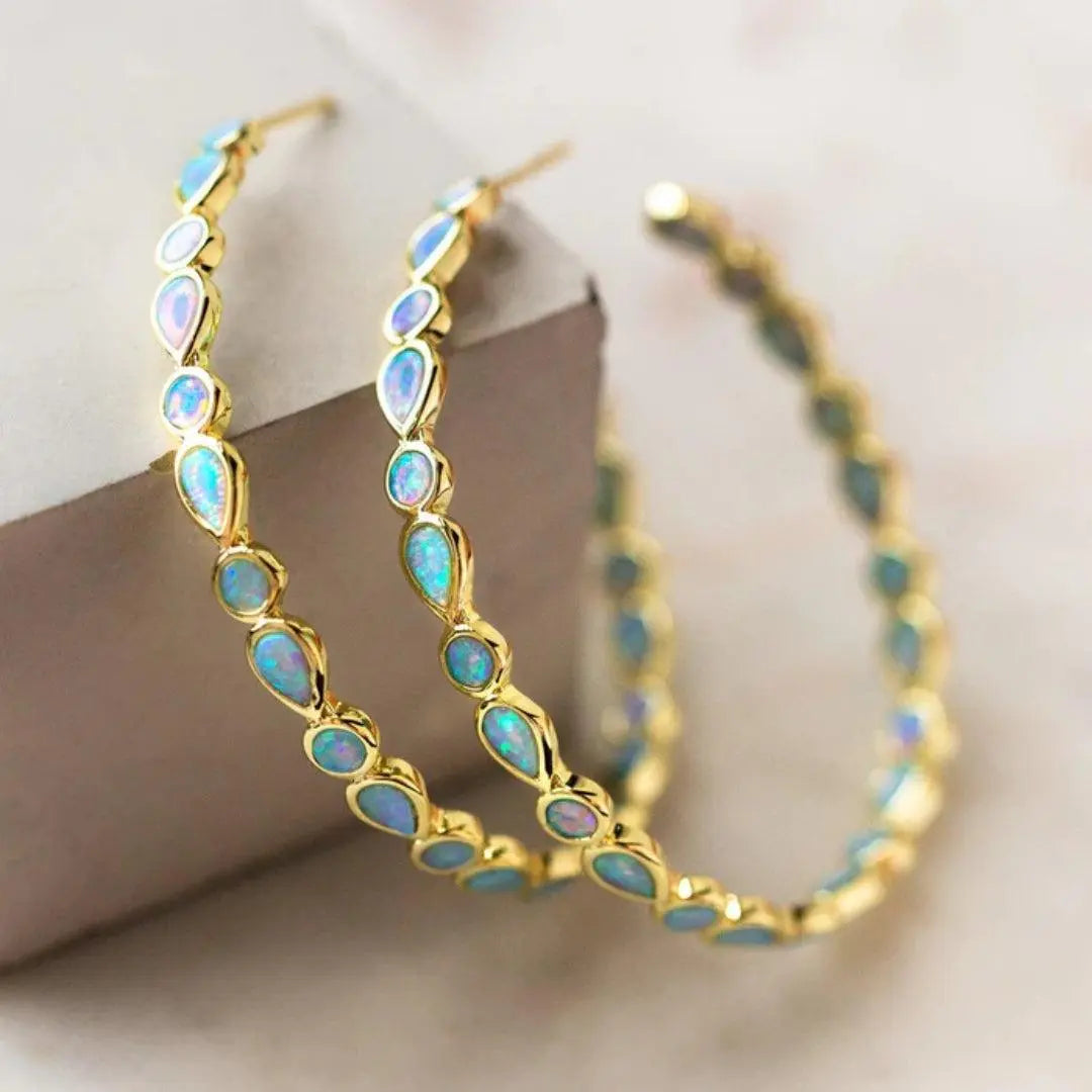 Vintage Ohrringe aus Gold mit blauem Opal